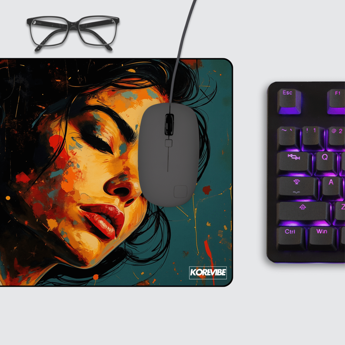 Abstract Female Portrait Gaming Mouse Pad on desk – vibrant female portrait in modern art style.
