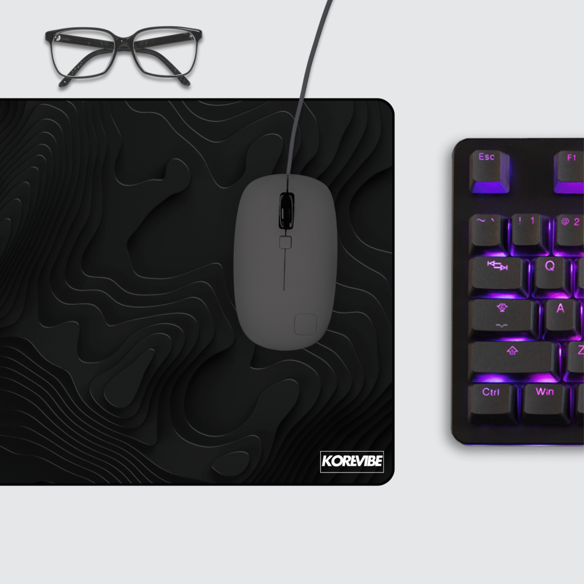 Dark Topography Gaming Mouse Pad on desktop – sleek black contour map design for modern workspaces