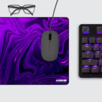 Fluid Abstract Gaming Mouse Pad on desktop – modern violet swirl design for gamers and creators