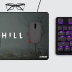 Silent Hill F gaming mouse pad on desktop setup with keyboard and mouse – horror-inspired art for gaming workspace.