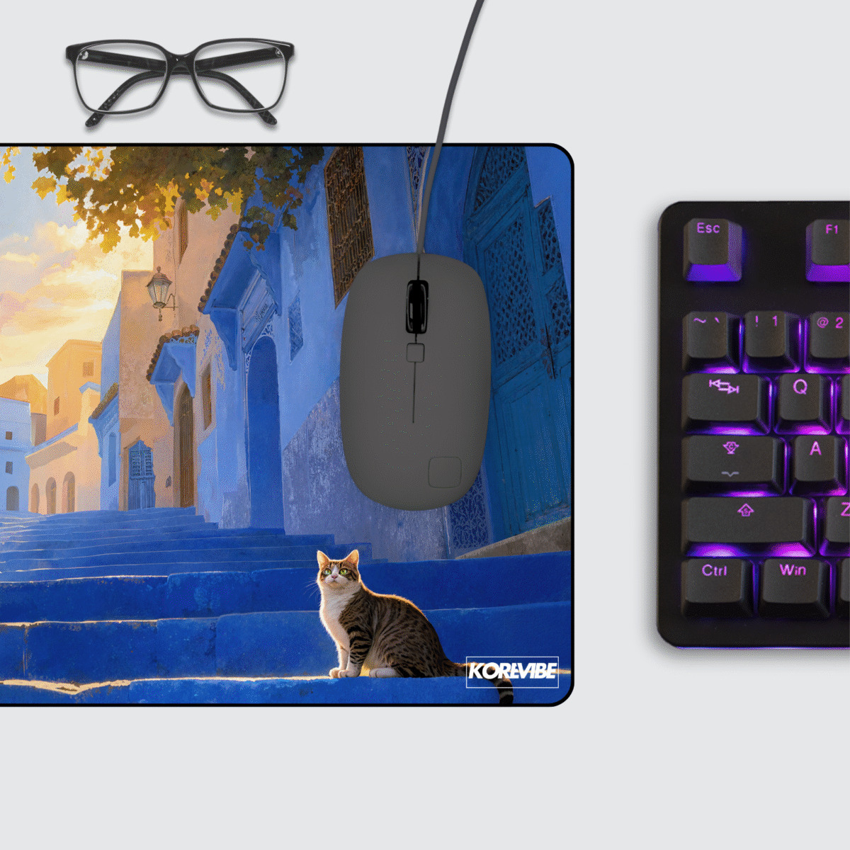 Sun-Drenched Blue City Gaming Mouse Pad on desk – Chefchaouen-inspired blue staircase art for gamers and creators