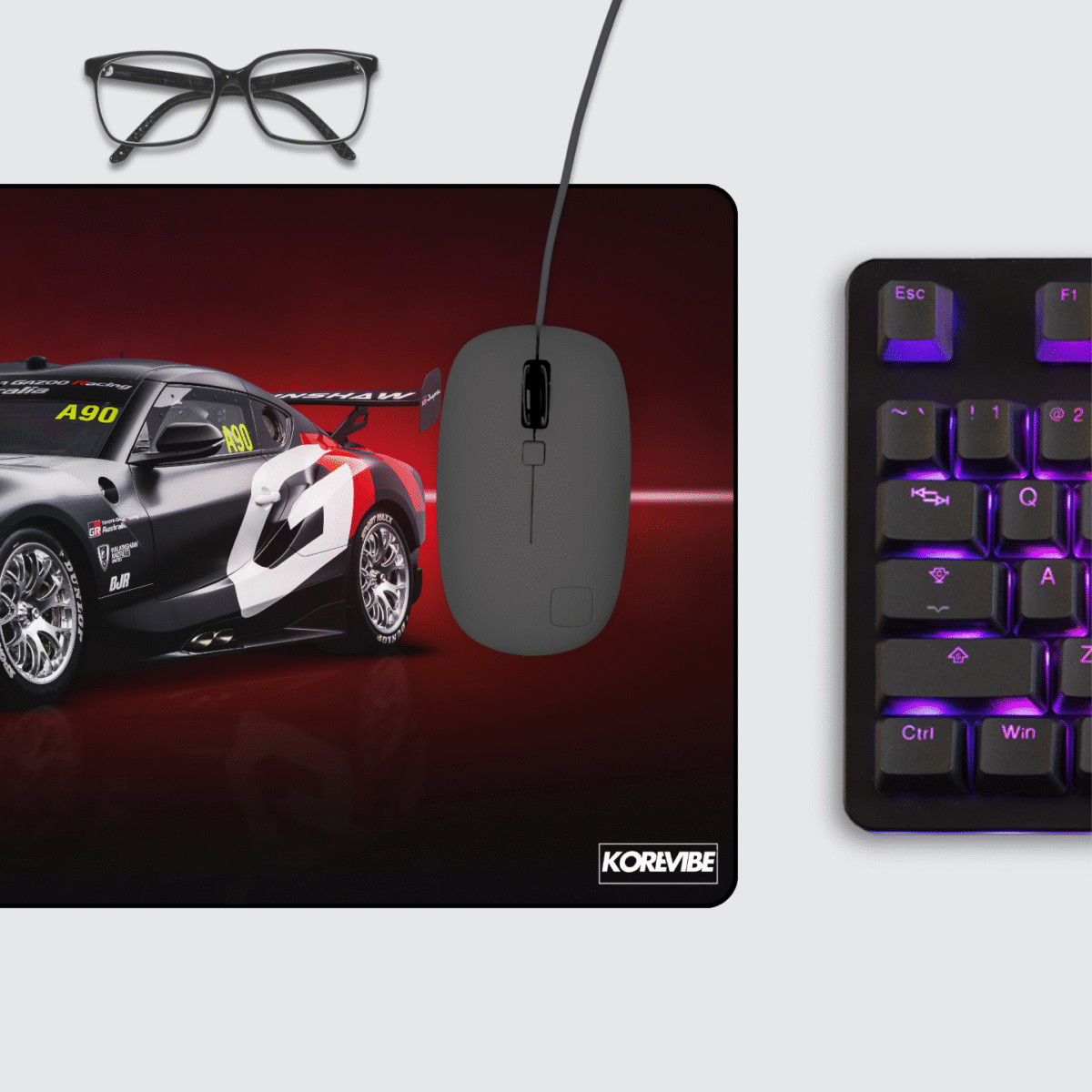 Toyota GR Supra A90 Gaming Mouse Pad on desktop setup – racing-inspired non-slip desk mat for gaming and office use.